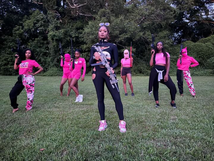 Goddesses and Guns squad in formation — pink-led training collective